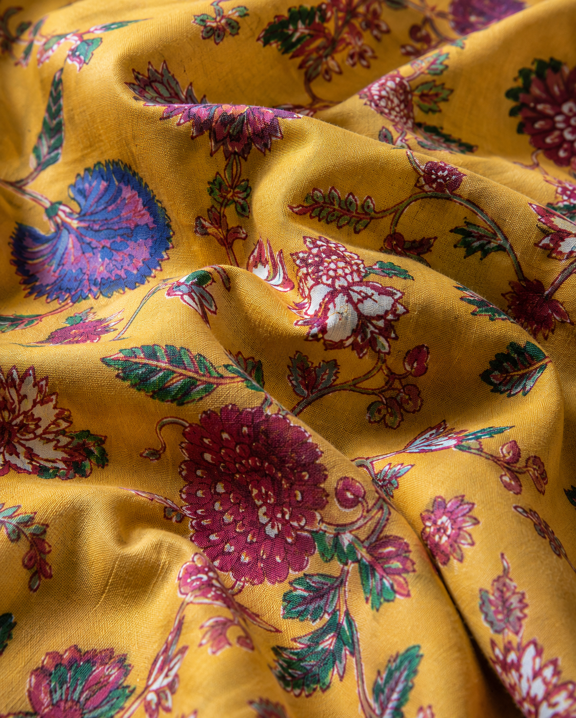 Mustard Kalamkari Floral Cambric Cotton Fabric
